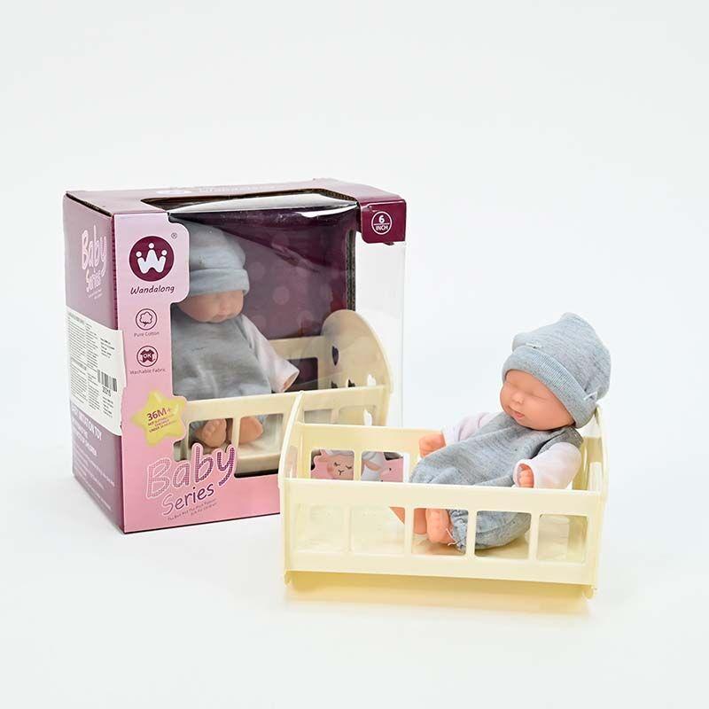 LOCO CROCO Бебе doll во креветче мало