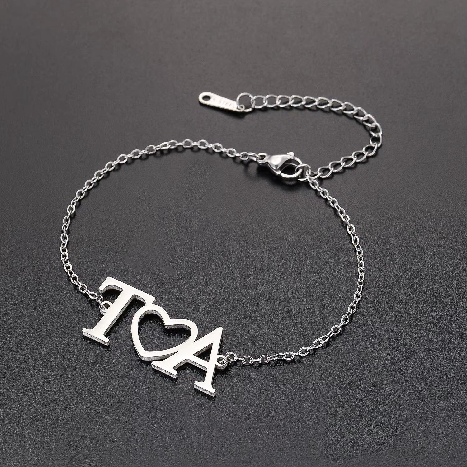 LUXARTO JEWELRY Нараквица со букви Т и А