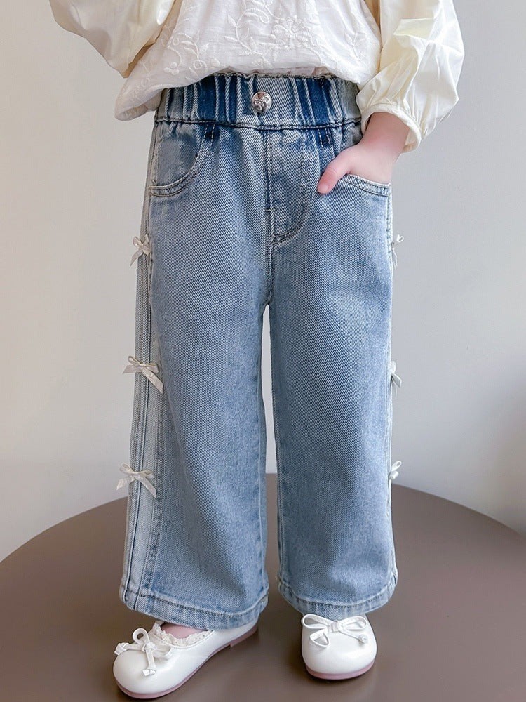 Фармерки со широк крој и панделки